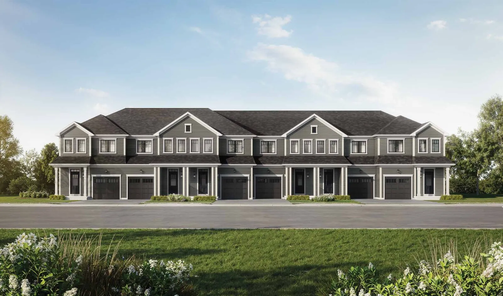 Rendering of a block of traditional 20-foot townhomes at Wellwood with front garages